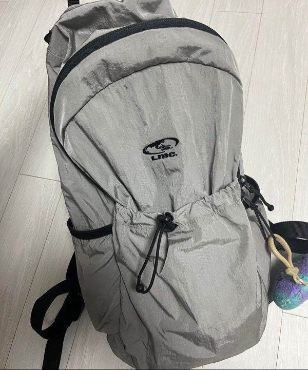 MUSINSA | LMC OVAL GLOBE RETINA BACKPACK black