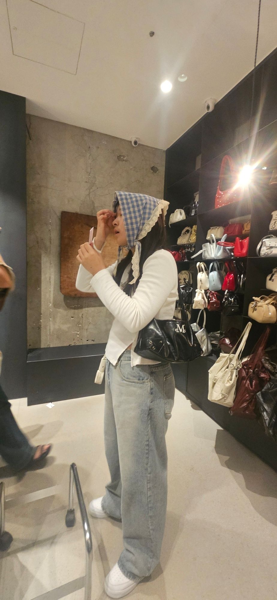 MUSINSA | MUCENT North Eyelet Leather Shoulder Bag Unisex