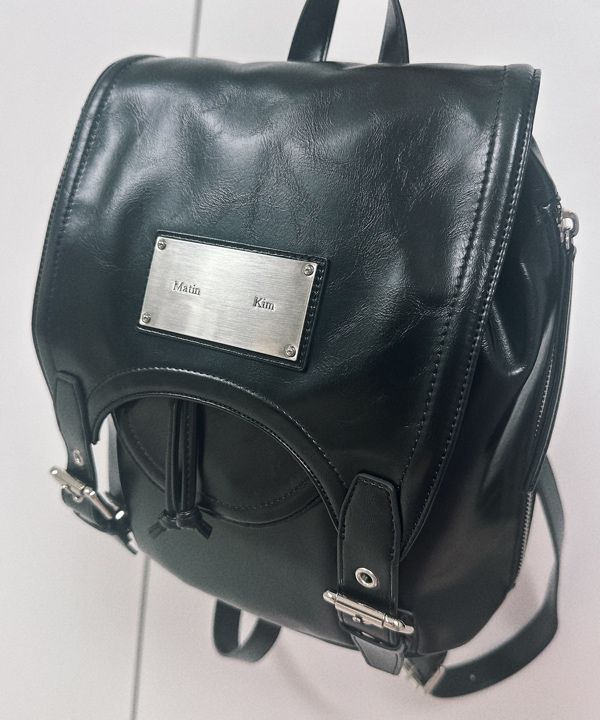 MUSINSA | MATIN KIM BUCKLE DETAIL BACK PACK IN BLACK