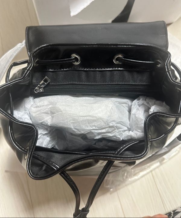 MUSINSA | MATIN KIM BUCKLE DETAIL BACK PACK IN BLACK