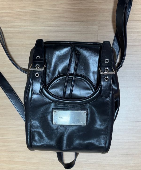 MUSINSA | MATIN KIM BUCKLE DETAIL BACK PACK IN BLACK