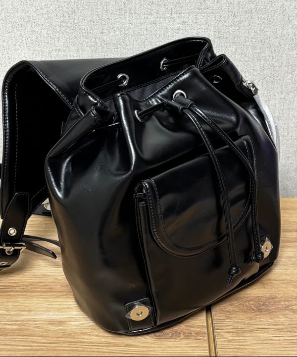 MUSINSA | MATIN KIM BUCKLE DETAIL BACK PACK IN BLACK