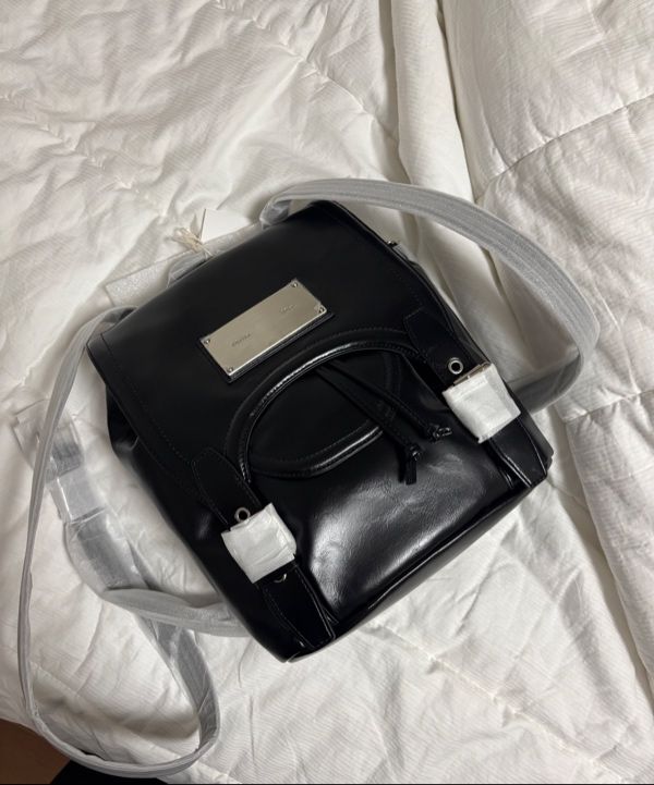Matin Kim☆BUCKLE DETAIL BACK PACK MUSINSA | MATIN KIM BUCKLE DETAIL BACK PACK IN BLACK