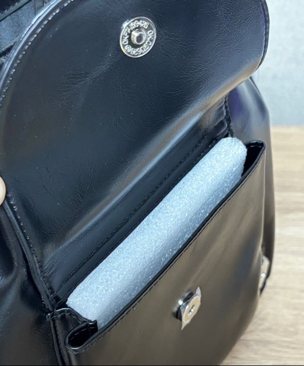 MUSINSA | MATIN KIM BUCKLE DETAIL BACK PACK IN BLACK