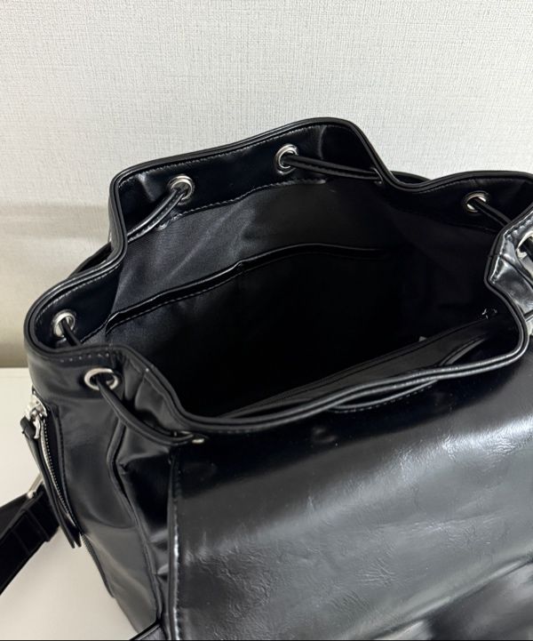 MUSINSA | MATIN KIM BUCKLE DETAIL BACK PACK IN BLACK