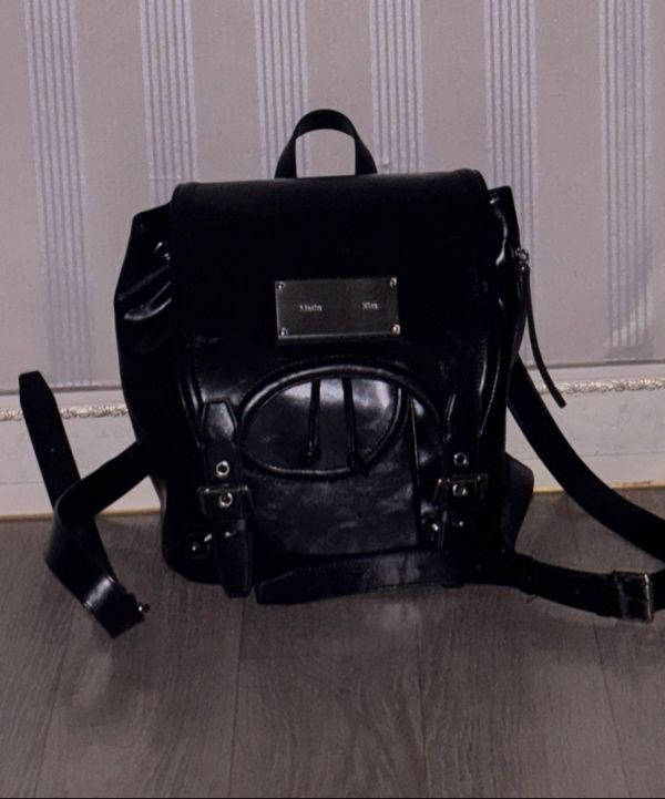 MUSINSA | MATIN KIM BUCKLE DETAIL BACK PACK IN BLACK