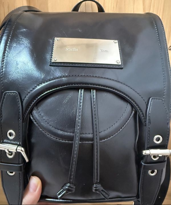MUSINSA | MATIN KIM BUCKLE DETAIL BACK PACK IN BLACK