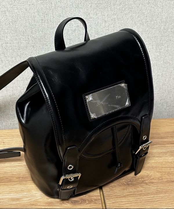 MUSINSA | MATIN KIM BUCKLE DETAIL BACK PACK IN BLACK