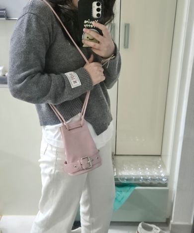 MUSINSA | MATIN KIM BELTED MINI BUCKET BAG IN PINK