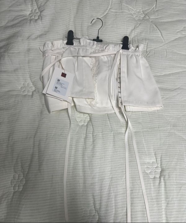 MUSINSA | MATIN KIM ROUGH PATCHWORK LAYERED SKIRT IN WHITE