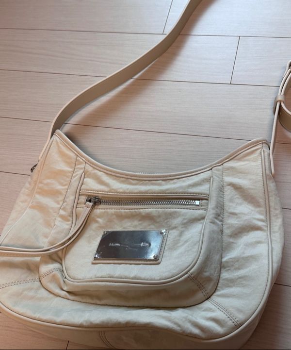 MUSINSA | MATIN KIM NYLON POCKET BAG IN BEIGE