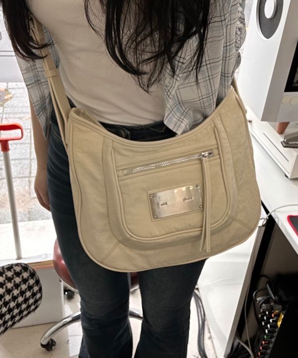 MUSINSA | MATIN KIM NYLON POCKET BAG IN BEIGE