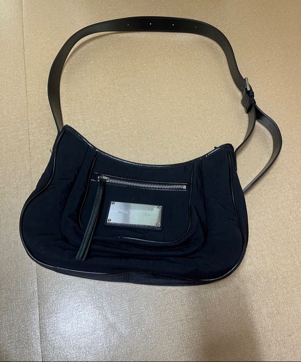 MUSINSA | MATIN KIM NYLON POCKET BAG IN BEIGE