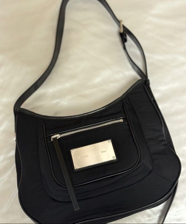 MUSINSA | MATIN KIM NYLON POCKET BAG IN BEIGE