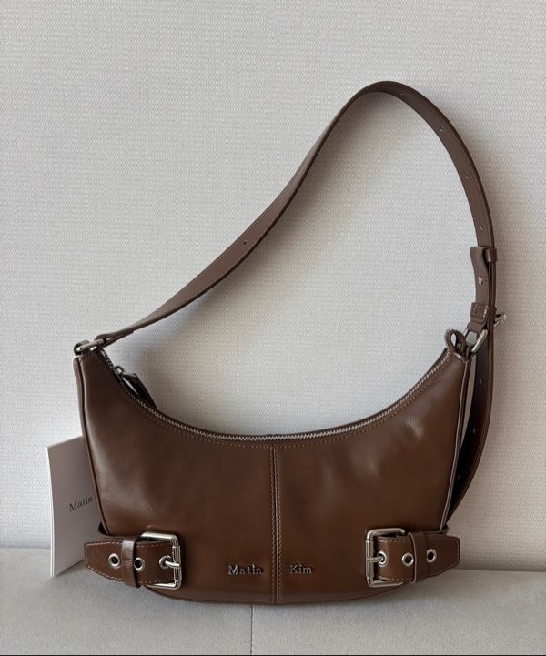 MUSINSA | MATIN KIM BELTED SHOULDER BAG IN BROWN