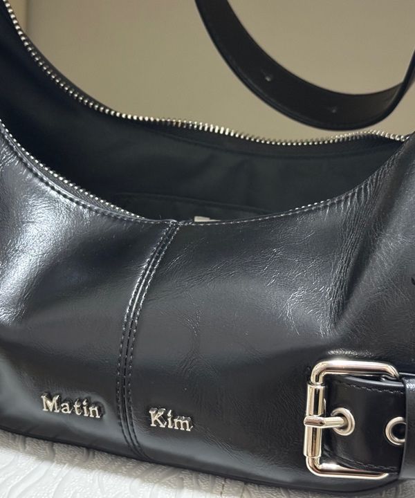 MUSINSA | MATIN KIM BELTED SHOULDER BAG IN BLACK