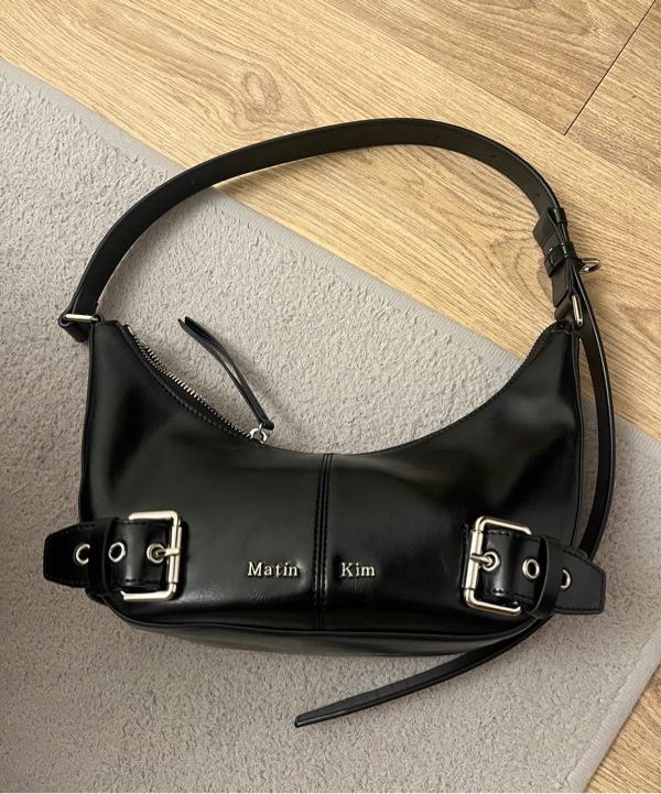 MUSINSA | MATIN KIM BELTED SHOULDER BAG IN BLACK