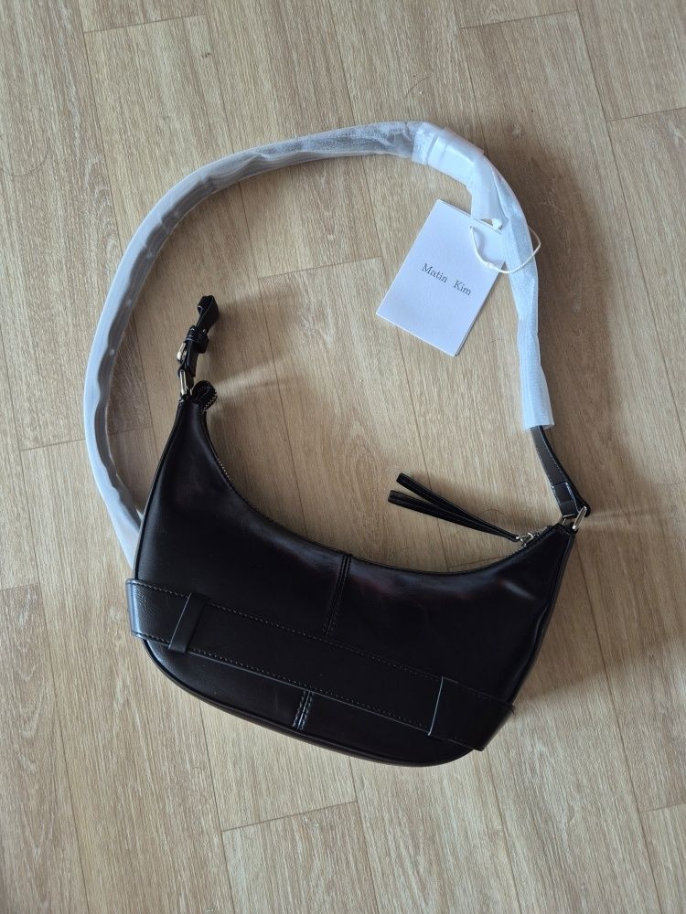 MUSINSA | MATIN KIM BELTED SHOULDER BAG IN BLACK