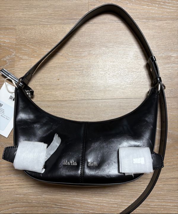 【Matin Kim】BELTED SHOULDER BAG MUSINSA | MATIN KIM BELTED SHOULDER BAG IN BLACK