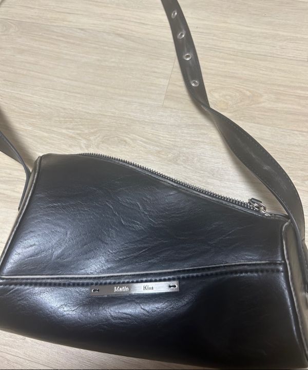 MUSINSA公式 | MATIN KIM DIRTY WASHED DIAGONAL BAG IN BLACK