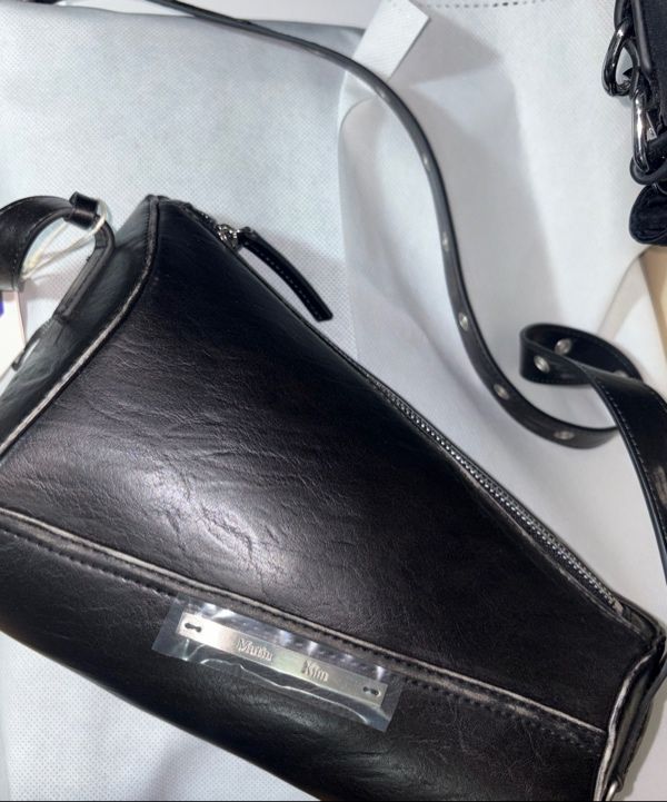 MUSINSA公式 | MATIN KIM DIRTY WASHED DIAGONAL BAG IN BLACK