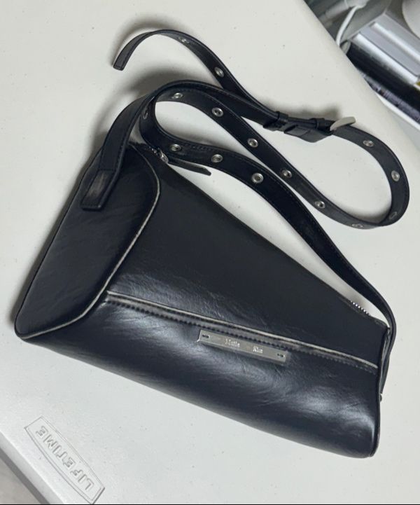 MUSINSA | MATIN KIM DIRTY WASHED DIAGONAL BAG IN BLACK