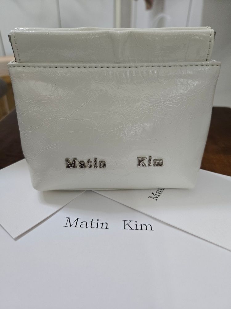MUSINSA | MATIN KIM GLOSSY LEATHER MINI WALLET BAG IN LIGHT