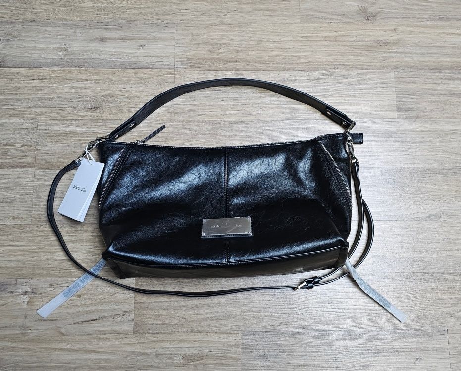 MUSINSA | MATIN KIM SIDE ZIPPER SHOULDER BAG IN BLACK