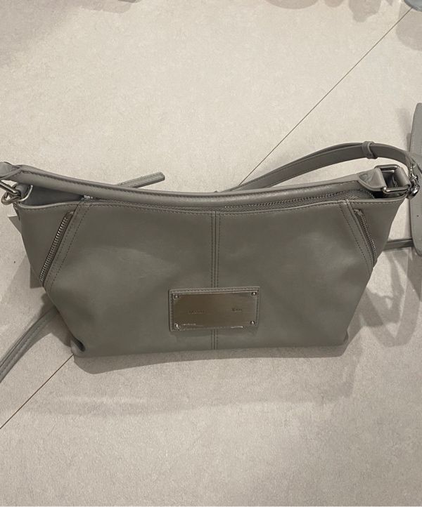 ショルダーバッグ・ポシェット [MATINKIM]side zipper two way bag in gray MUSINSA | MATIN KIM SIDE ZIPPER TWO WAY BAG IN GREY