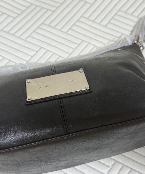 ショルダーバッグ・ポシェット [MATINKIM]side zipper two way bag in black MUSINSA | MATIN KIM SIDE ZIPPER TWO WAY BAG IN BLACK