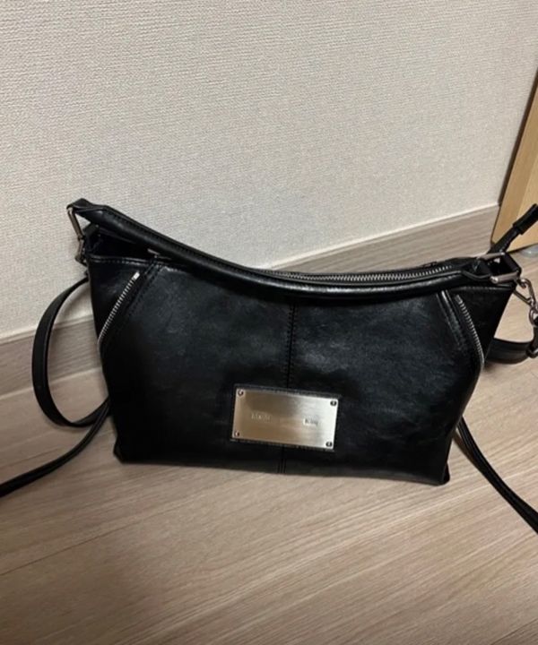 MUSINSA | MATIN KIM SIDE ZIPPER TWO WAY BAG IN BLACK