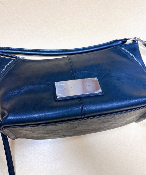 MUSINSA公式 | MATIN KIM SIDE ZIPPER TWO WAY BAG IN BLACK