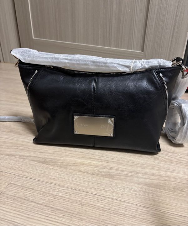 MUSINSA | MATIN KIM SIDE ZIPPER TWO WAY BAG IN BLACK