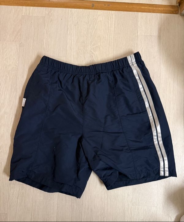 MUSINSA | thisisneverthat® GORE-TEX WINDSTOPPER® Track Short