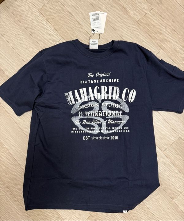 MUSINSA | MAHAGRID ARCHIVE LOGO TEE BLACK(MG2FMMT513A)