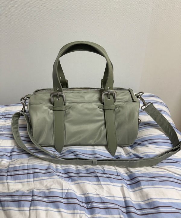 MUSINSA | SUNBURN PROJECT Padded Symbol Travel Bag, SAGE GREEN