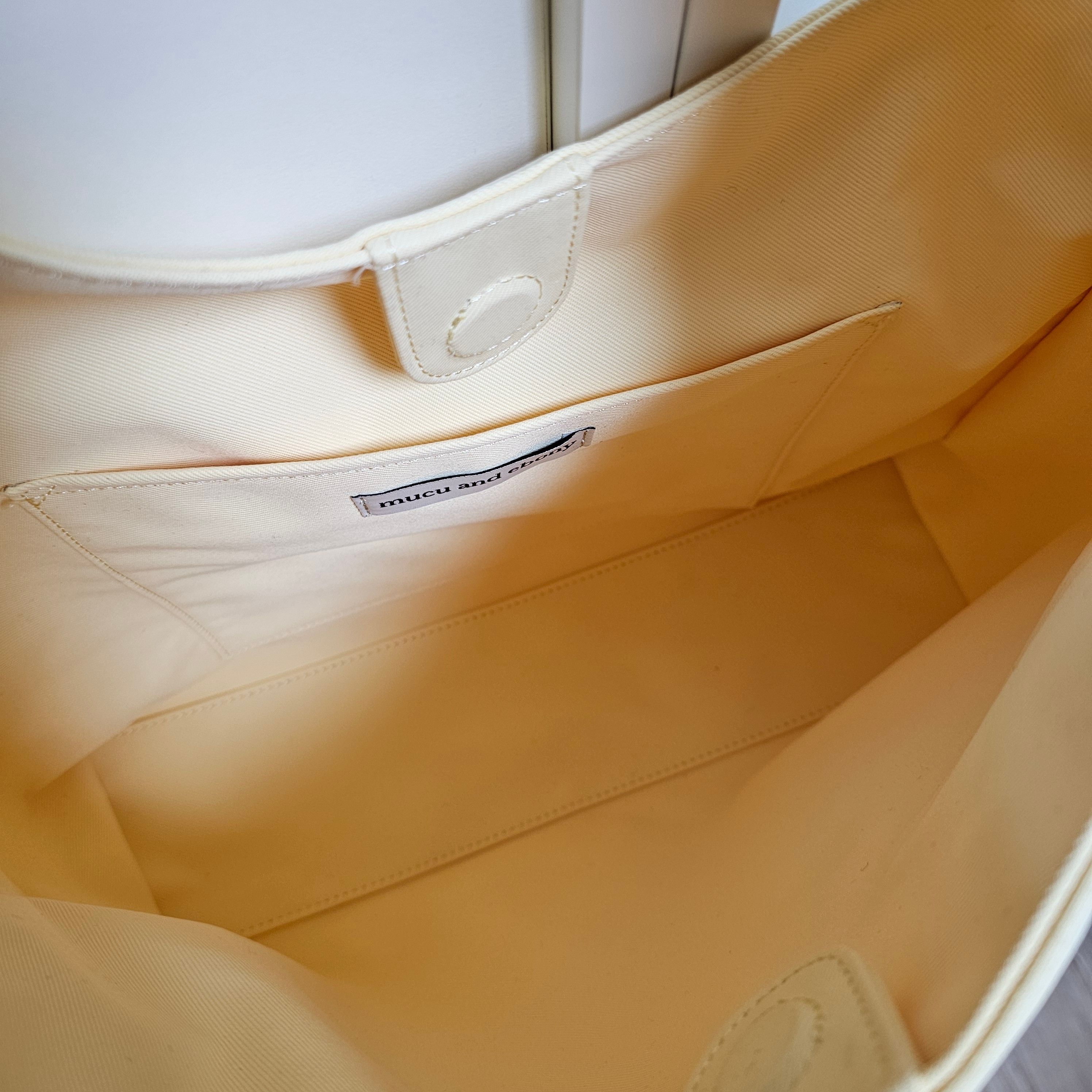 MUSINSA | MUCU AND EBONY Soft Bag Soft Bag Lemon Yellow