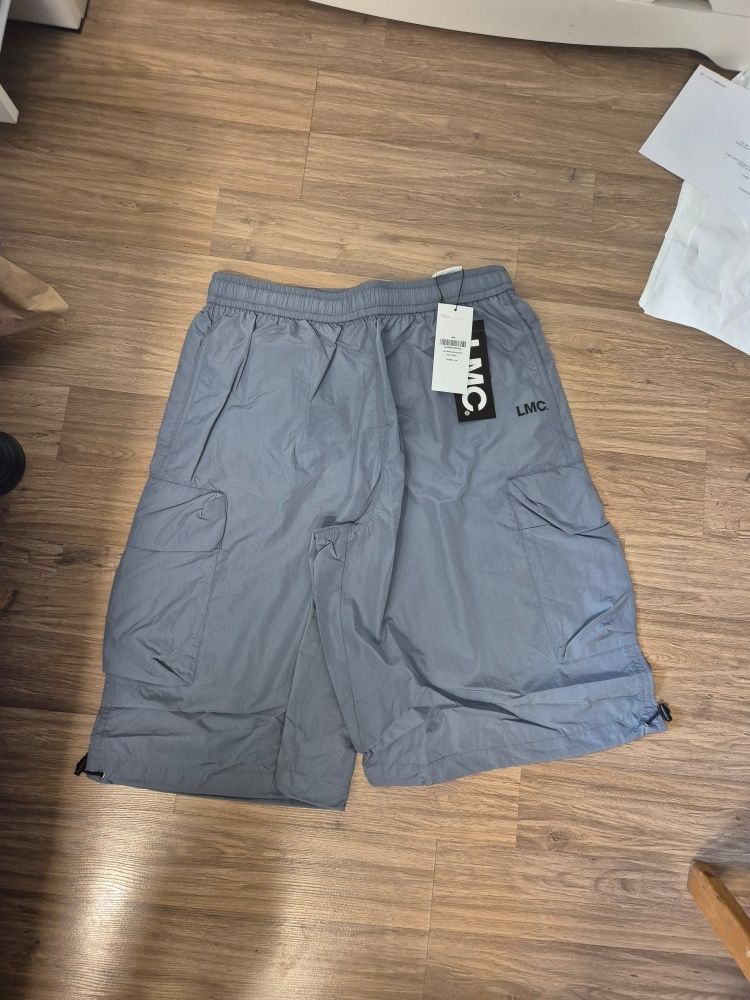 [LMC]UNISEX★OG BERMUDA SHORTS MUSINSA | LMC OG BERMUDA SHORTS khaki brown