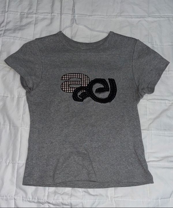 MUSINSA公式 | AEAE APPLIQUE LOGO TEE [MELANGE GREY]