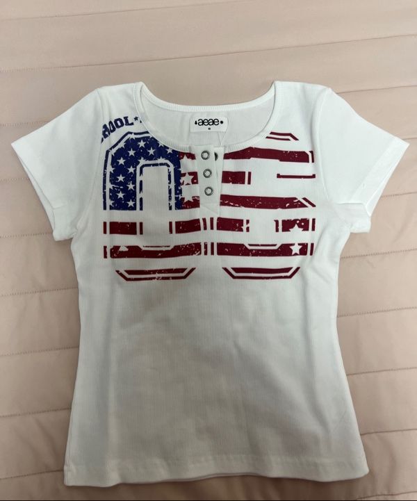★2025SS新作★aeae★USA BANNER HENLY NECK TEE MUSINSA公式 | AEAE USA BANNER HENLY NECK TEE [MELANGE GREY]
