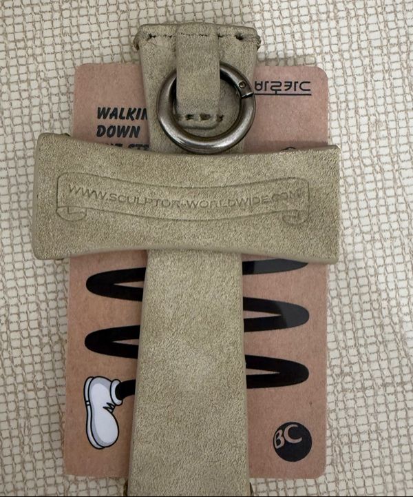 MUSINSA | SCULPTOR Cross Suede Strap Wallet Raw