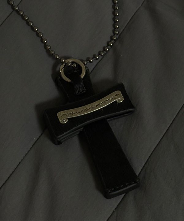 MUSINSA | SCULPTOR Cross Hair On Strap Wallet Black