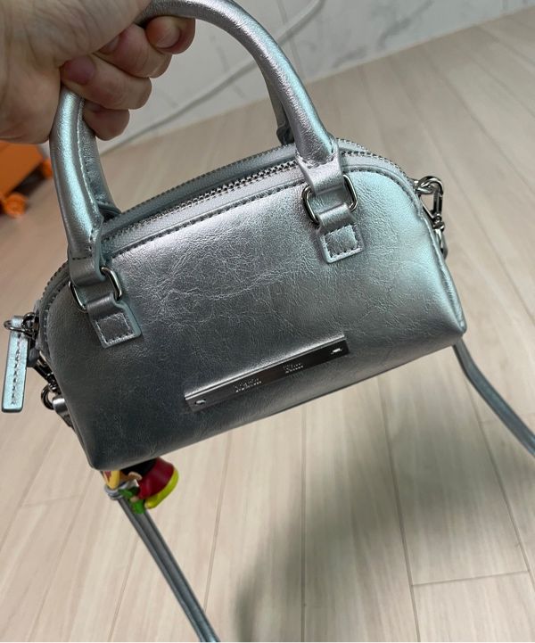 MUSINSA | MATIN KIM DOUBLE ZIPPER MINI CROSS BAG IN SILVER