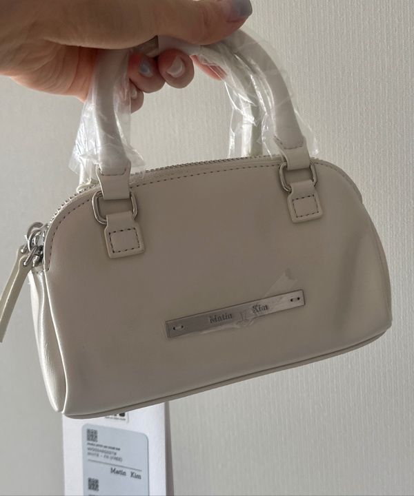MUSINSA | MATIN KIM DOUBLE ZIPPER MINI CROSS BAG IN WHITE
