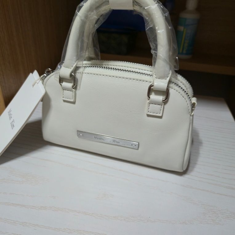 MUSINSA | MATIN KIM DOUBLE ZIPPER MINI CROSS BAG IN WHITE