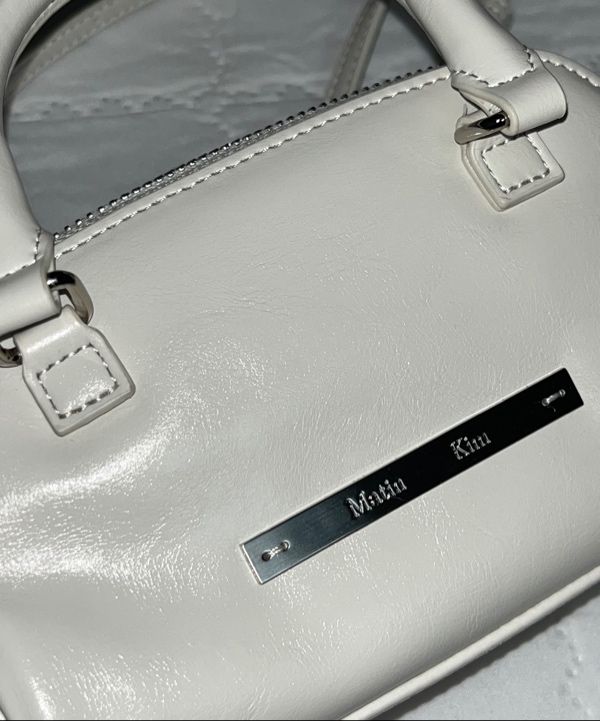 MUSINSA | MATIN KIM DOUBLE ZIPPER MINI CROSS BAG IN BLACK