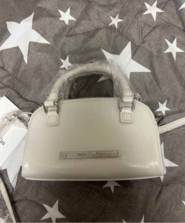 MUSINSA公式 | MATIN KIM DOUBLE ZIPPER MINI CROSS BAG IN SILVER