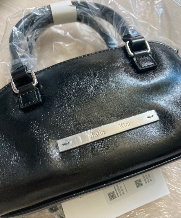 MUSINSA公式 | MATIN KIM DOUBLE ZIPPER MINI CROSS BAG IN BLACK
