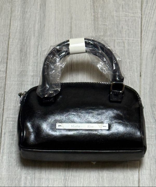 MUSINSA公式 | MATIN KIM DOUBLE ZIPPER MINI CROSS BAG IN BLACK