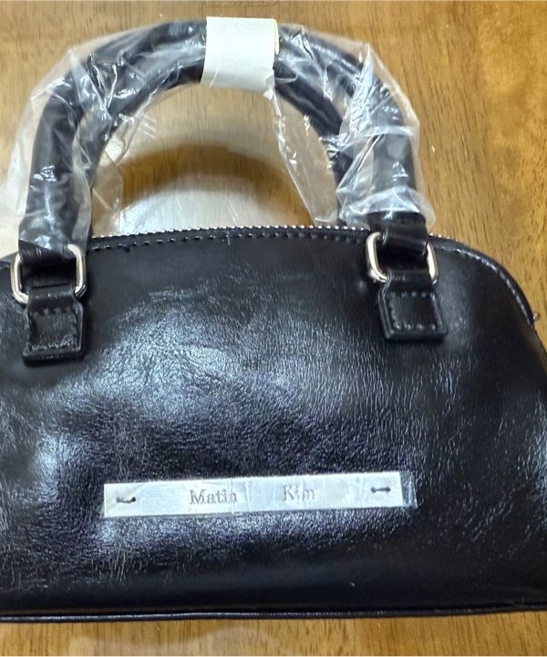 MUSINSA公式 | MATIN KIM DOUBLE ZIPPER MINI CROSS BAG IN BLACK